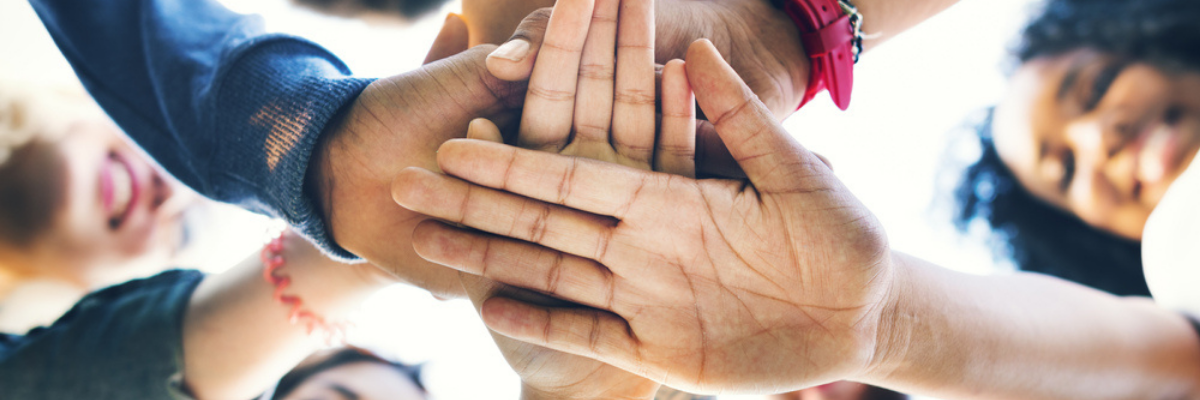 Show of all hands together of children